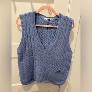 Cute knitted vest.